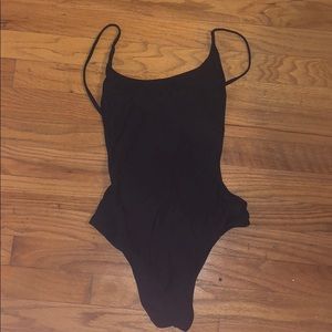 Sunnyco black stretchy low back one piece suit
